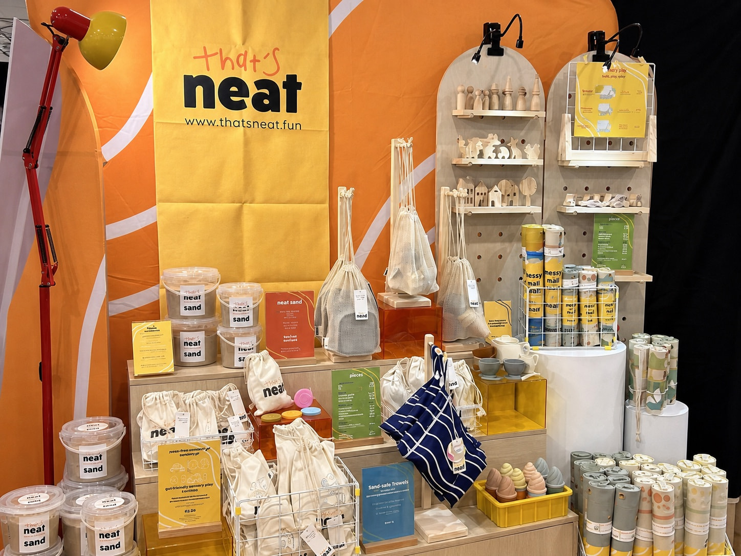 Closer view of the that's neat event backdrop and branded booth setup