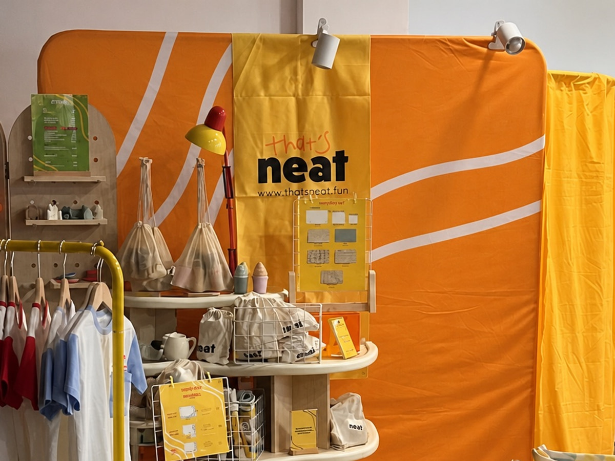 Detail view of the that's neat printed backdrop in the event space